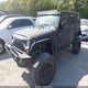 1J4BA6H13BL544185 2011 Jeep Wrangler Unlimited Rubicon auction photo thumbnail 2