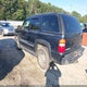 1GNEK13Z03J342439 2003 Chevrolet Tahoe Lt auction photo thumbnail 3