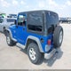 1J4FA39SX2P771017 2002 Jeep Wrangler X auction photo thumbnail 3