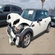 WMWMF3C58ATU77216 2010 Mini Cooper auction photo thumbnail 2