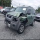 5J6YH18334L014621 2004 Honda Element Lx auction photo thumbnail 2