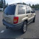 1J4GX48S11C665569 2001 Jeep Grand Cherokee Laredo auction photo thumbnail 4
