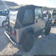 1J4FA49S62P704565 2002 Jeep Wrangler Sport auction photo thumbnail 4