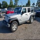 1J4BA3H12AL110501 2010 Jeep Wrangler Unlimited Sport auction photo thumbnail 2