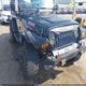1J4FA59S14P777173 2004 Jeep Wrangler Sahara auction photo thumbnail 6