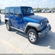 1J4BA3H13AL217914 2010 Jeep Wrangler Unlimited Sport auction photo thumbnail 1