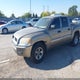 1Z3HT48N06S596814 2006 Mitsubishi Raider Xls auction photo thumbnail 2