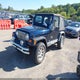 1J4FA29P4YP773084 2000 Jeep Wrangler Se auction photo thumbnail 2