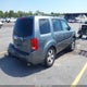 5FNYF3H51AB008162 2010 Honda Pilot Ex-L auction photo thumbnail 4