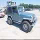 1J4FY29P7WP767000 1998 Jeep Wrangler Se auction photo thumbnail 1