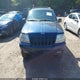 1J4GW58N4YC325524 2000 Jeep Grand Cherokee Limited auction photo thumbnail 6