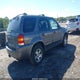 1FMCU94185KA94998 2005 Ford Escape Limited auction photo thumbnail 4