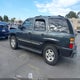 1GNEK13T14J215115 2004 Chevrolet Tahoe Lt auction photo thumbnail 3