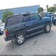 1GNEK13T14J215115 2004 Chevrolet Tahoe Lt auction photo thumbnail 4