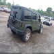 1C4BJWDG0FL585492 2015 Jeep Wrangler Unlimited Sport auction photo thumbnail 4