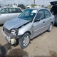 1HGES16591L052088 2001 Honda Civic Lx auction photo thumbnail 2