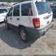1J4GX48S71C657394 2001 Jeep Grand Cherokee Laredo auction photo thumbnail 3