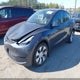 7SAYGDEE9PF922212 2023 Tesla Model Y Awd/Long Range Dual Motor All-Wheel Drive auction photo thumbnail 2