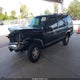 1GNEC13R8XJ385784 1999 Chevrolet Tahoe Lt auction photo thumbnail 2