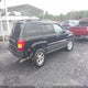 1J4GW48N31C556091 2001 Jeep Grand Cherokee Laredo auction photo thumbnail 4