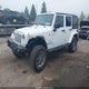 1C4BJWEG5GL321796 2016 Jeep Wrangler Unlimited Sahara auction photo thumbnail 2