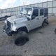 1C4HJWDG8CL246808 2012 Jeep Wrangler Unlimited Sport auction photo thumbnail 2