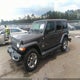1C4HJXEG1JW240591 2018 Jeep Wrangler Unlimited Sahara 4X4 auction photo thumbnail 2