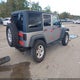 1C4BJWDG0FL521002 2015 Jeep Wrangler Unlimited Sport auction photo thumbnail 4