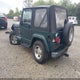 1J4FA59S5YP700649 2000 Jeep Wrangler Sahara auction photo thumbnail 3