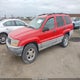 1J4GW48S4YC141958 2000 Jeep Grand Cherokee Laredo auction photo thumbnail 2