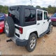 1C4BJWEG6EL320931 2014 Jeep Wrangler Unlimited Sahara auction photo thumbnail 4