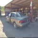 1YVGF22C0X5869205 1999 Mazda 626 Es/Lx auction photo thumbnail 3