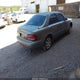 1YVGF22C0X5869205 1999 Mazda 626 Es/Lx auction photo thumbnail 4
