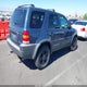 1FMYU03141KF10476 2001 Ford Escape Xlt auction photo thumbnail 4