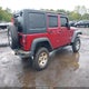 1C4BJWDG8CL131406 2012 Jeep Wrangler Unlimited Sport auction photo thumbnail 4