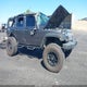 1C4BJWDG4EL183683 2014 Jeep Wrangler Unlimited Sport auction photo thumbnail 1