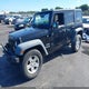1C4BJWDG2EL138774 2014 Jeep Wrangler Unlimited Sport auction photo thumbnail 2