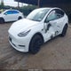 7SAYGDEE1NF329599 2022 Tesla Model Y Long Range Dual Motor All-Wheel Drive auction photo thumbnail 2