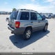 1J4GW48SX1C728557 2001 Jeep Grand Cherokee Laredo auction photo thumbnail 4