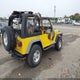 1J4FA49S91P328135 2001 Jeep Wrangler Sport auction photo thumbnail 4