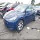 7SAYGAEE9NF467163 2022 Tesla Model Y Long Range Dual Motor All-Wheel Drive auction photo thumbnail 2