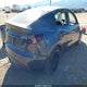 7SAYGAEE1PF869892 2023 Tesla Model Y Awd/Long Range Dual Motor All-Wheel Drive auction photo thumbnail 4