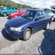 JT2BG22K4X0307527 1999 Toyota Camry Le auction photo thumbnail 2