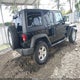 1C4BJWDG4FL519432 2015 Jeep Wrangler Unlimited Sport auction photo thumbnail 4