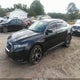 1FAHP2KT0FG188106 2015 Ford Taurus Sho auction photo thumbnail 2