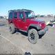1C4HJWDG2CL274023 2012 Jeep Wrangler Unlimited Sport auction photo thumbnail 1