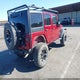 1C4HJWDG2CL274023 2012 Jeep Wrangler Unlimited Sport auction photo thumbnail 4