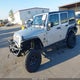 1J4GA59129L711452 2009 Jeep Wrangler Unlimited Sahara auction photo thumbnail 2