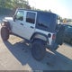 1J4GA59129L711452 2009 Jeep Wrangler Unlimited Sahara auction photo thumbnail 3