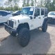 1J4BA3H18AL228245 2010 Jeep Wrangler Unlimited Sport auction photo thumbnail 2